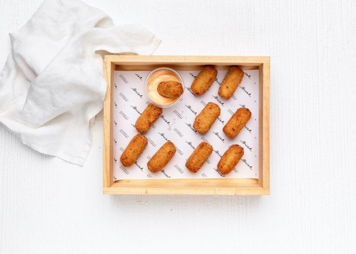 Mac and Cheese Croquettes with Sriracha Mayo.
